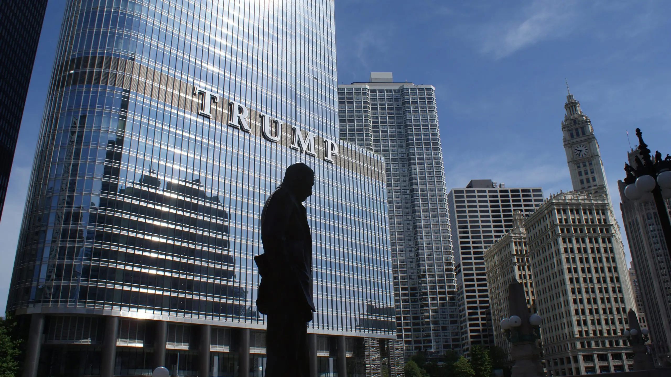 silhouette of statue near trump building at daytime 936237 scaled