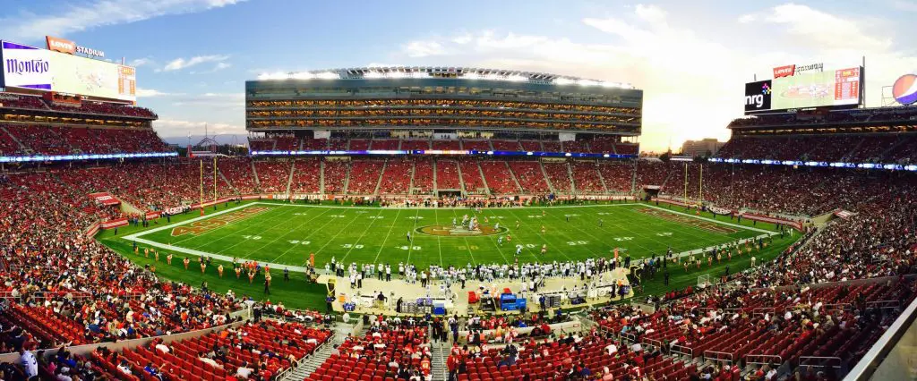 nfl stadium field full with crowd watching the game during 128457 scaled