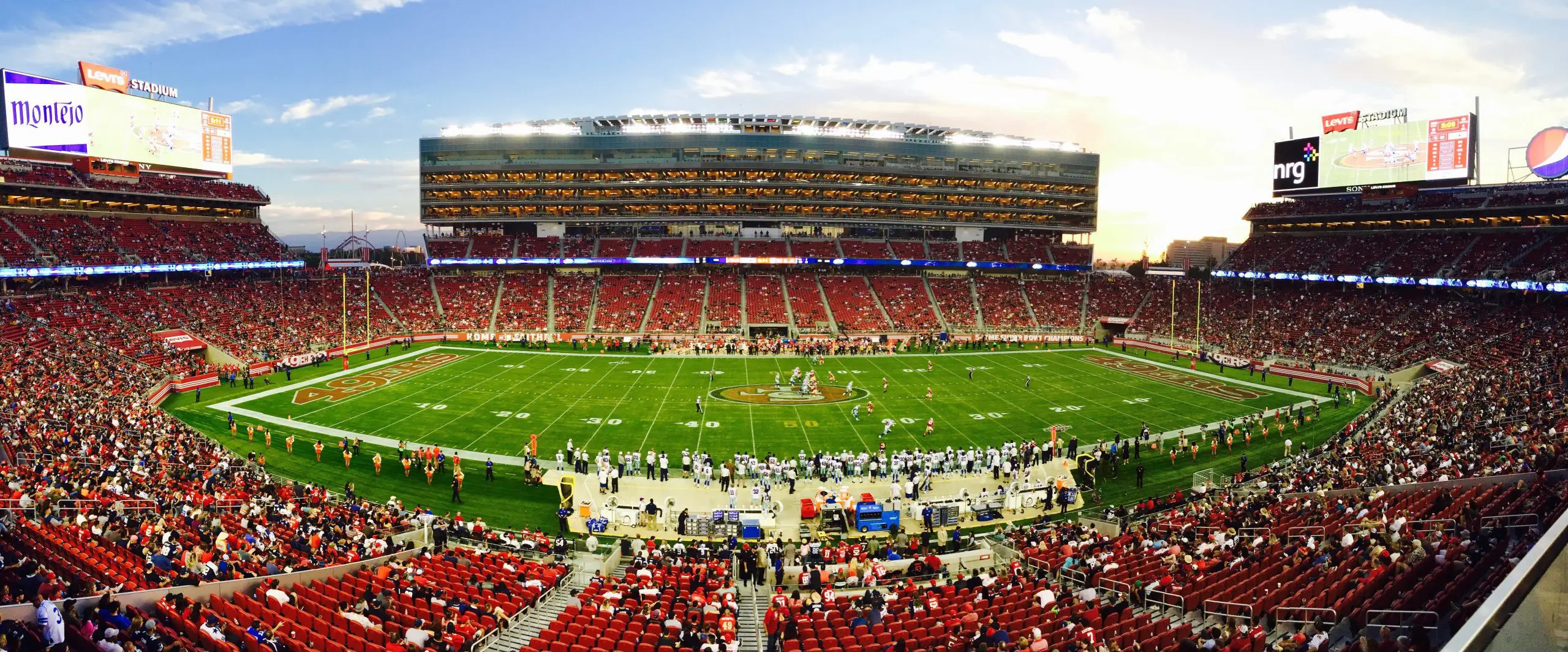 nfl stadium field full with crowd watching the game during 128457 scaled