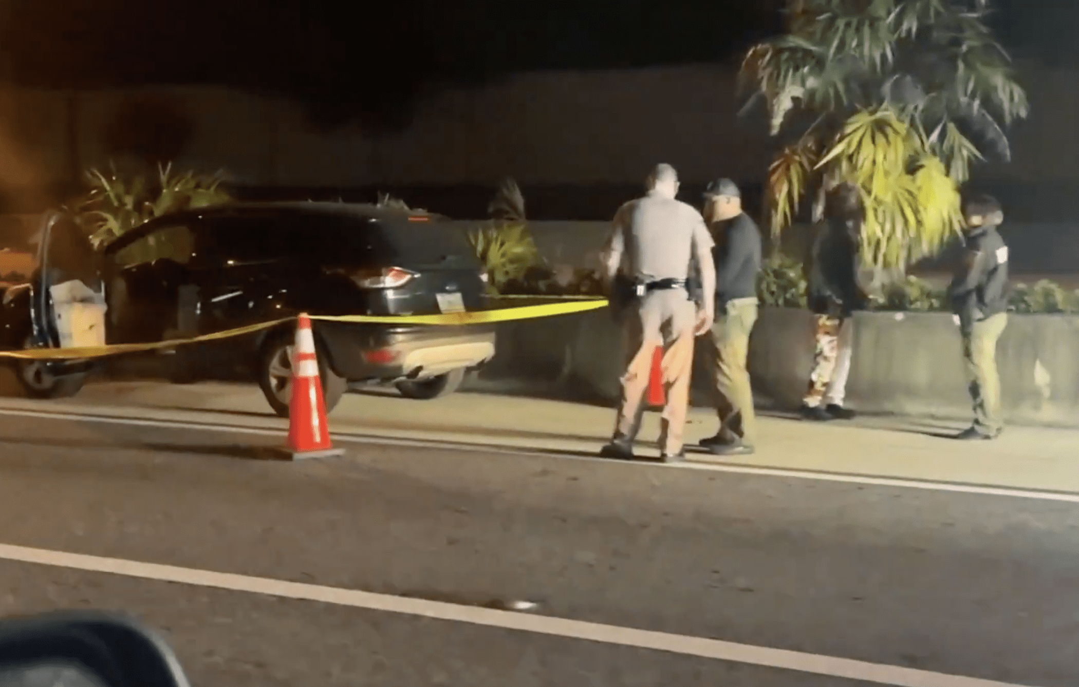 Woman injured after being shot while driving on I-595