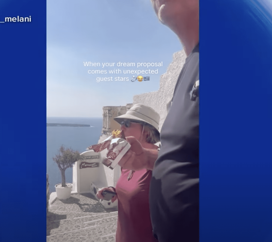 Proposal gets photobombed by candy bar
