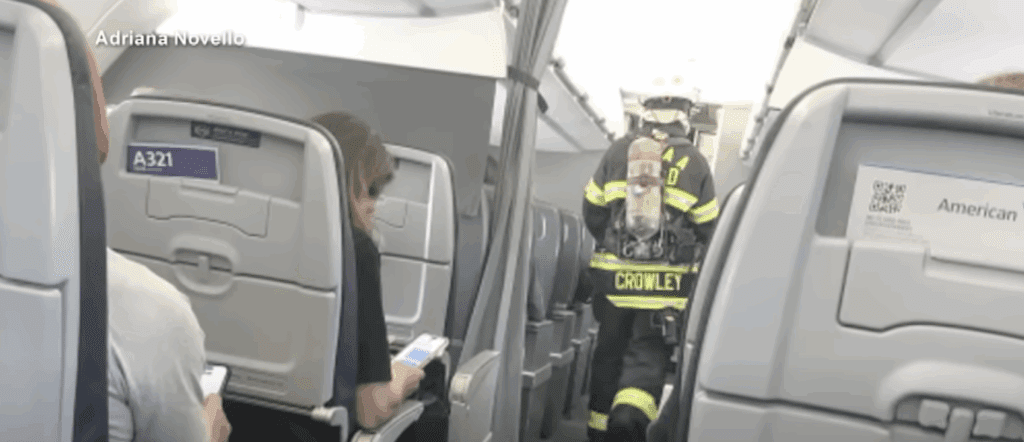 Plane diverted after passenger's device goes up in flames