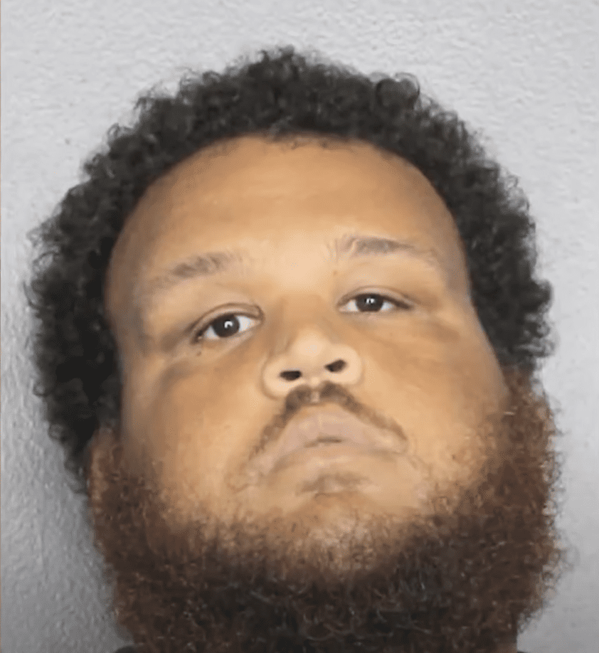 coach arrested after hitting students