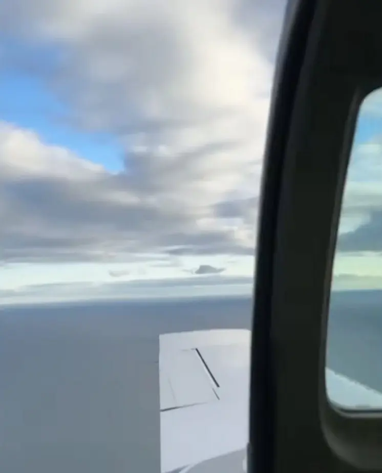 Plane door blows open mid-flight
