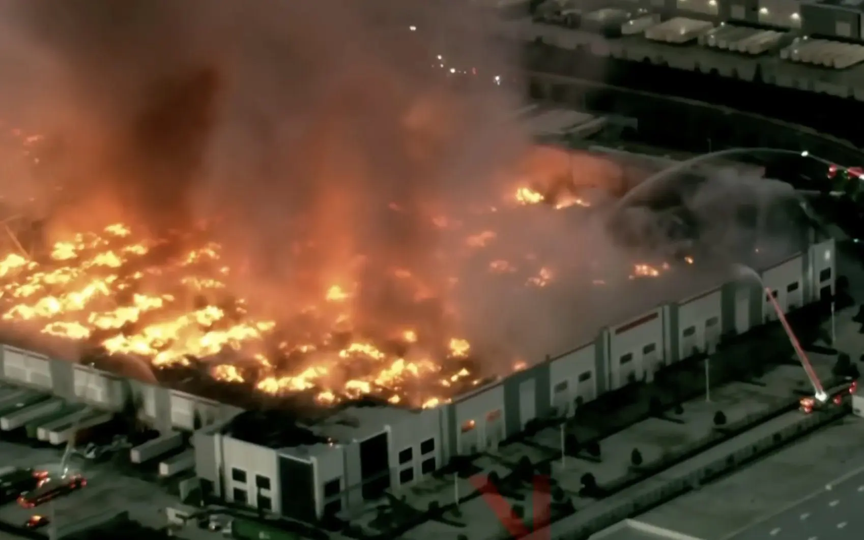 Man arrested over massive warehouse fire