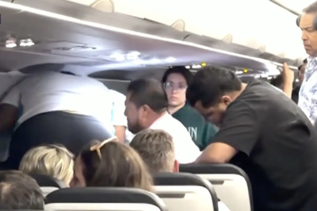 Man Trying to Enter Cockpit During Flight