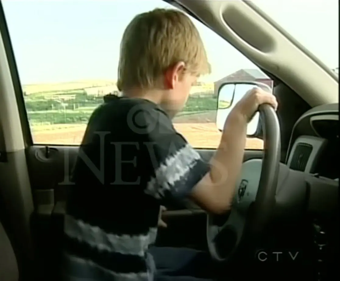 boy drives truck