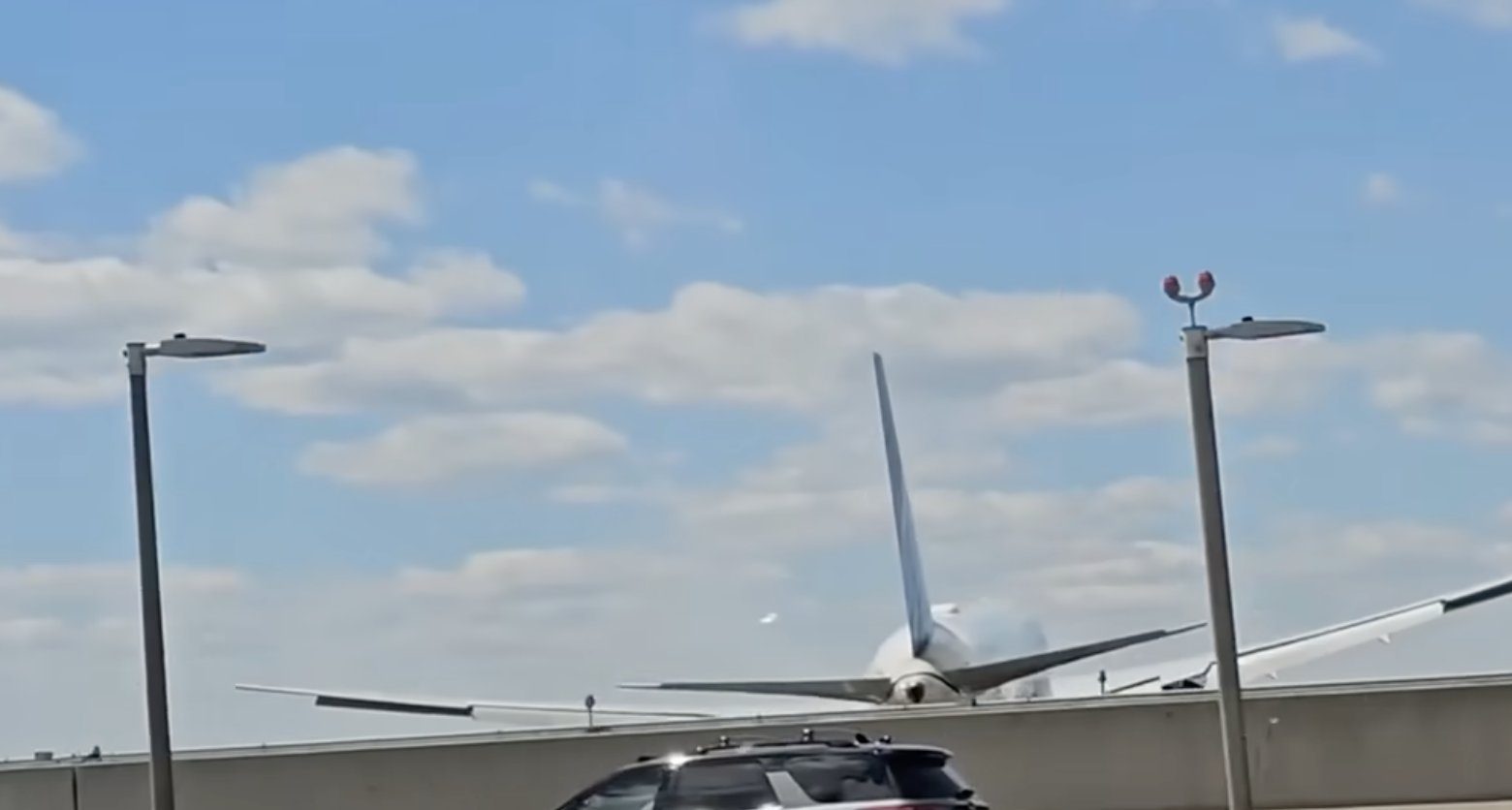 United flight hits light pole while landing